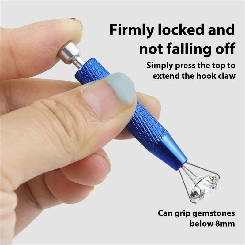 A hand is pressing a blue diamond setting tool to extend a hook claw for gripping gemstones.