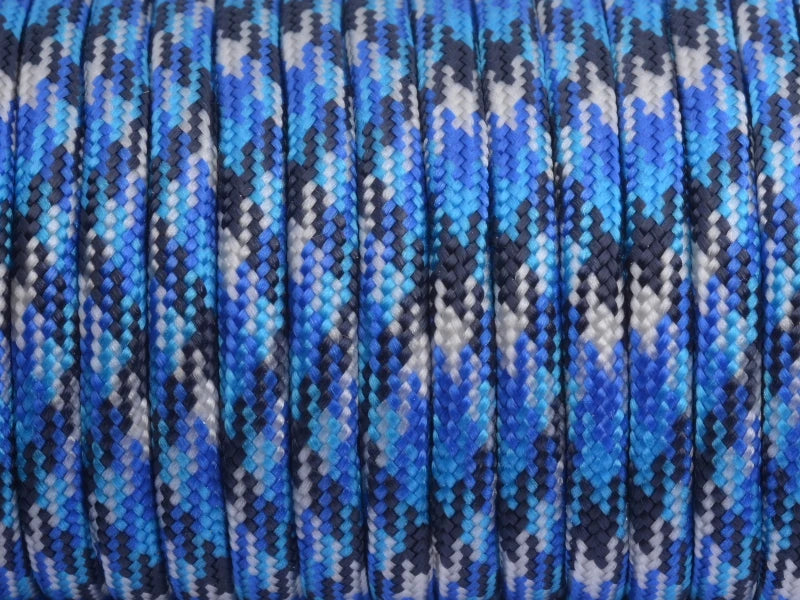 Bobine de corde paracorde bleue, noire et blanche pour escalade et camping.