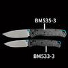A set of two BM535-3 and BM533-3 folding knives with black carbon fiber handles and silver blades.