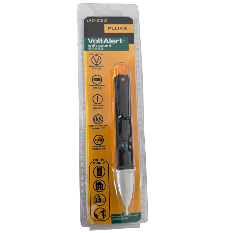 A yellow and black non-contact AC voltage detector pen labeled FLUKE VoltAlert with sound.