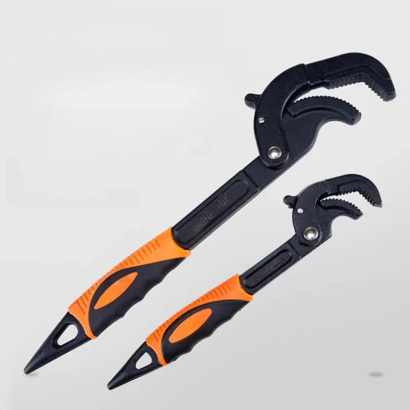 A pair of black and orange heavy duty adjustable steel wrench set tools.