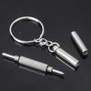 Silver adjustable silicone eyeglass nose pads attached to a screwdriver