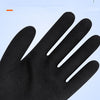 A close-up view of a black palm-coated foam latex winter glove.