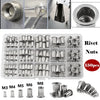 A set of precision rivet gun components including rivets, nuts, and various sizes of rivets and nuts.