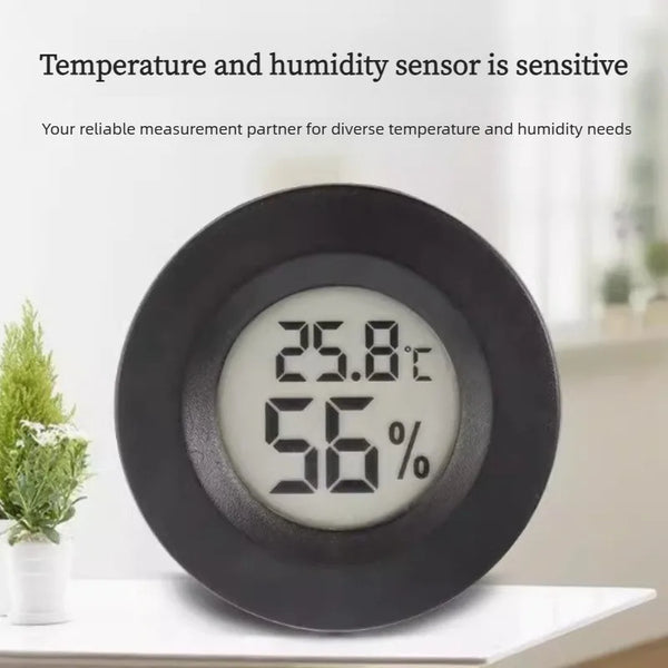 A black digital indoor humidity and temperature meter displaying 25.8°C and 56%.