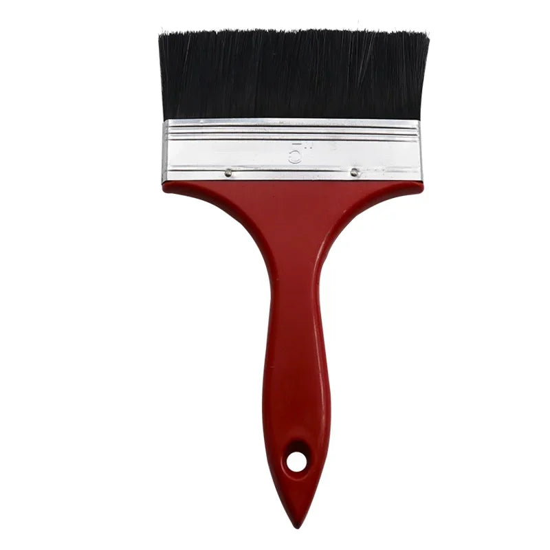 A red paint brush with a black bristles and silver ferrule.