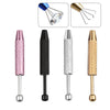A set of precision diamond setting tools including a glass tool, pliers, and various metal tips.