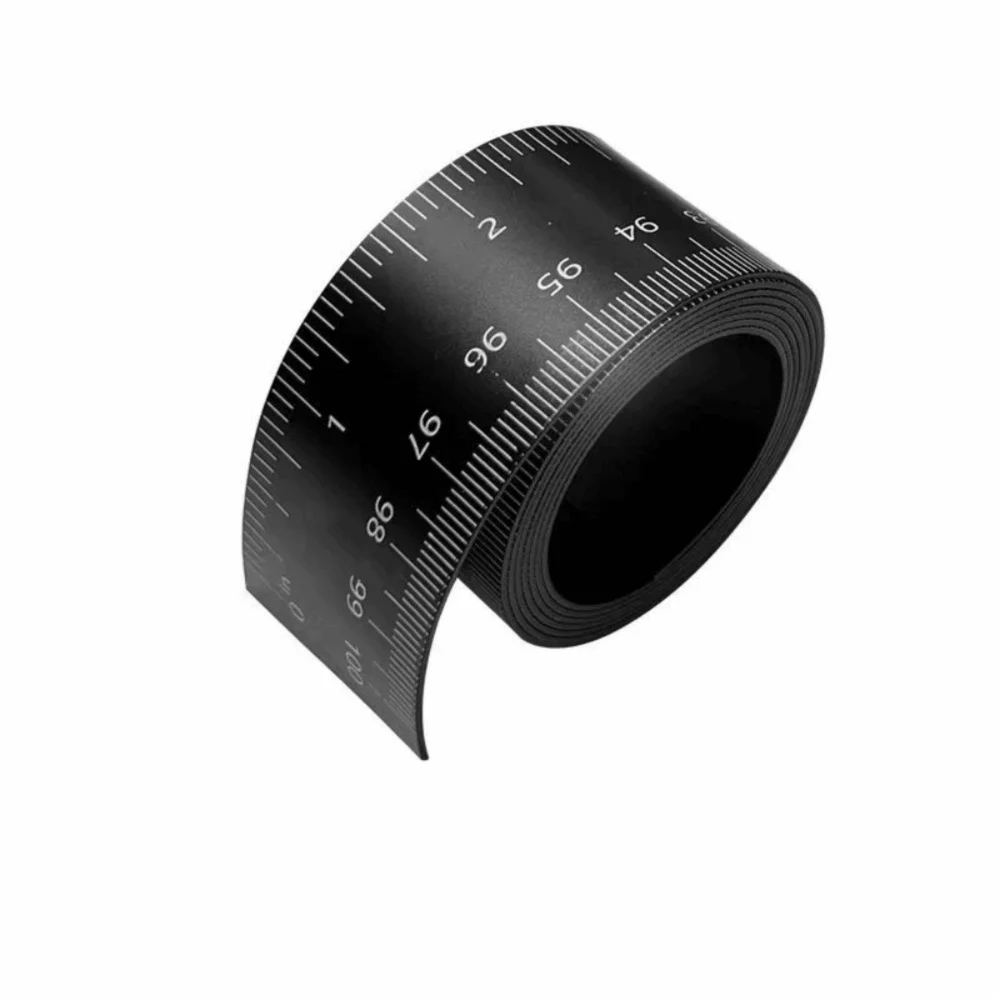 A black magnetic dual scale flexible measuring ruler showing markings from 0 to 100.