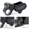 Loupe pliable noire avec lentille et lumières LED, vue sous différents angles.