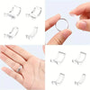 Various clear silicone adjuster pads and rings for ring sizing shown on fingers and in isolation.