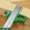 A green precision angle scriber and ruler positioning block set is shown measuring wood with a 45 to 90 degree angle.