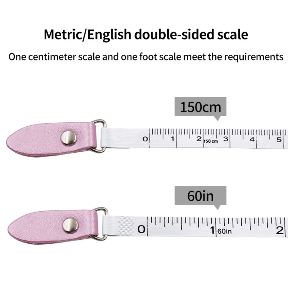 Pink double-sided metric and English measuring tape showing centimeter and foot scales