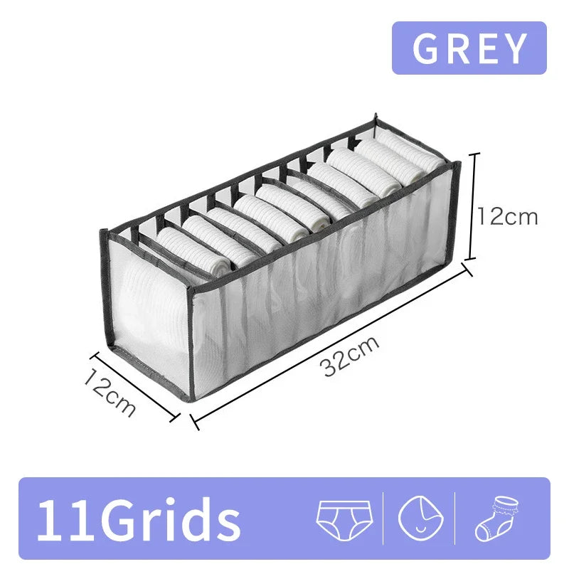 A grey fabric storage organizer box with 11 grids for organizing items.