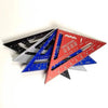 A set of five precision aluminum triangle rulers in black, silver, blue, and red.