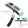 A silver digital weighing scale with a long webbing strap and hook type for measuring luggage.