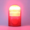 A red solar infrared motion sensor security alarm with a clear lens and a circular button.