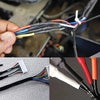 A close-up of heat shrink tubing kit showing various colored wires and insulation materials for wire protection.