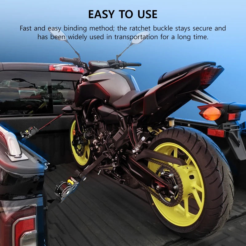 A black motorcycle is shown with a yellow tire and a heavy duty ratchet tie down strap being used for transportation.