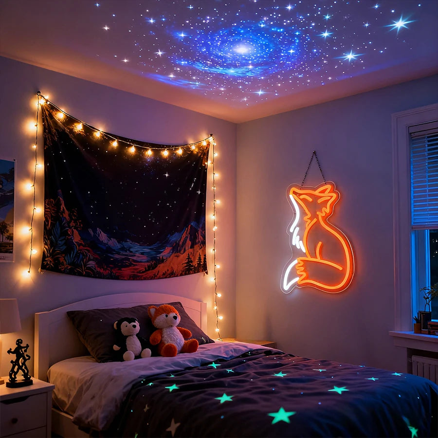 A bedroom decorated with a starry ceiling and a neon fox wall sign above a bed.