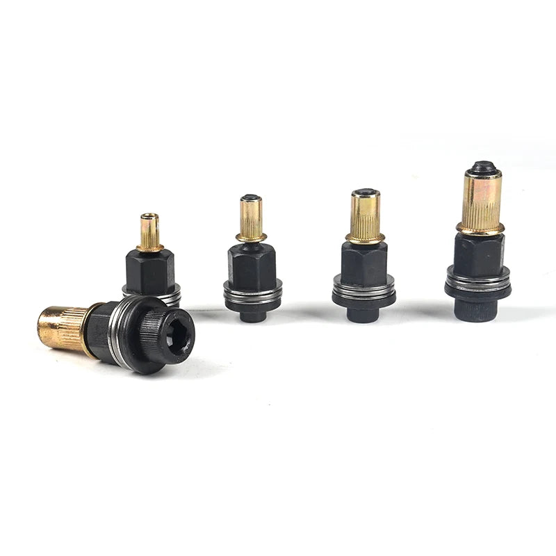 A set of brass and black precision hand rivet nuts for DIY projects.