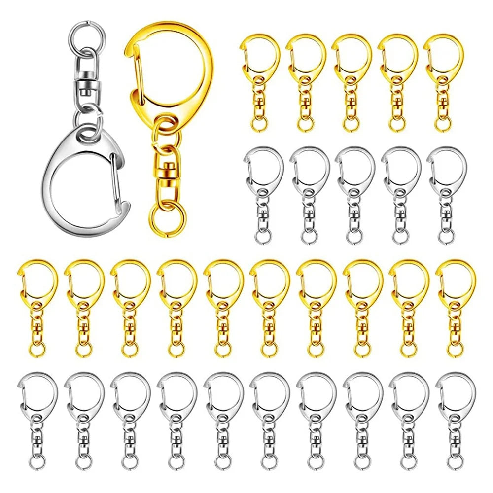 A collection of silver and gold lobster clasp key rings for DIY jewelry making.