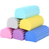 A stack of colorful PVA absorbent cleaning sponges in various shades including light blue, white, yellow, purple, and blue.