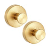 A round, brass-toned shower hook with a circular mounting plate.