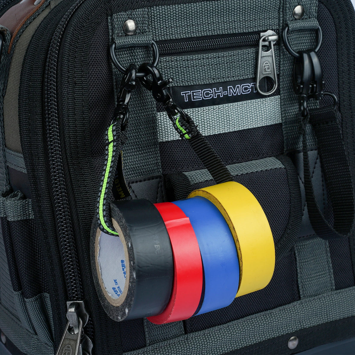 A black tool bag features an adjustable electrical tape holder with colored tape rolls inside.