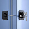 A black baby safety cabinet lock with a key is shown attached to a light blue cabinet door.