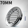 A close-up view of a round stainless steel air vent grille with a 70mm diameter, designed for wall protection.