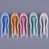 A set of five colored portable contact lens tools, including blue, orange, pink, mint green, and white.