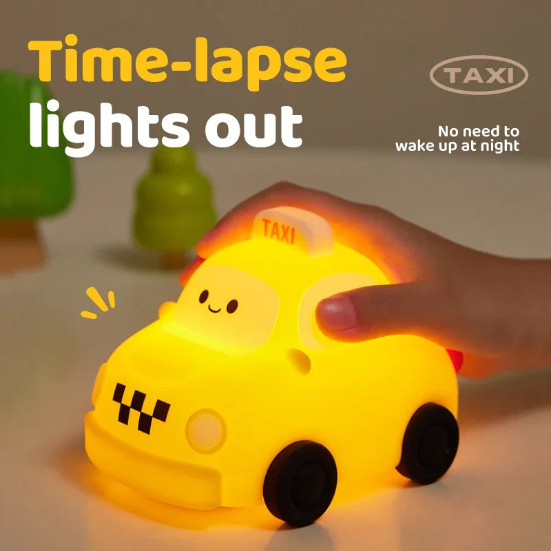A hand is holding a yellow time-lapse lights out car night light illuminating a surface.