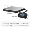 A digital shipping scale with a stainless steel platform and a handheld display, showing various measurements.