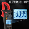 A red and black digital clamp meter with a backlight display showing 3.099 volts on a dark background.