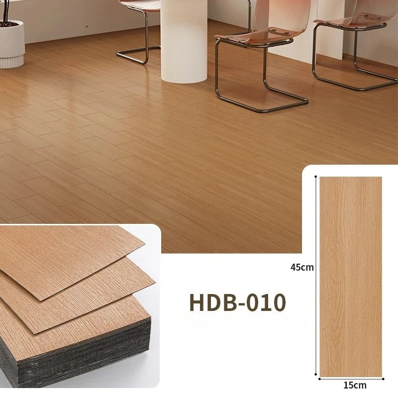Close-up view of light wood grain floor tiles and a sample board with dimensions 45cm by 15cm.