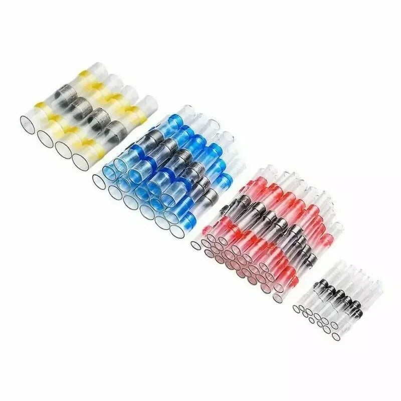 Una colección de conectores de alambre con retracción térmica de varios tamaños en colores amarillo, azul y rojo.
