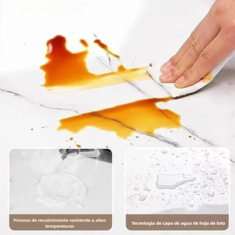 Main appliquant un autocollant mural sur marbre, démontrant un revêtement résistant à haute température