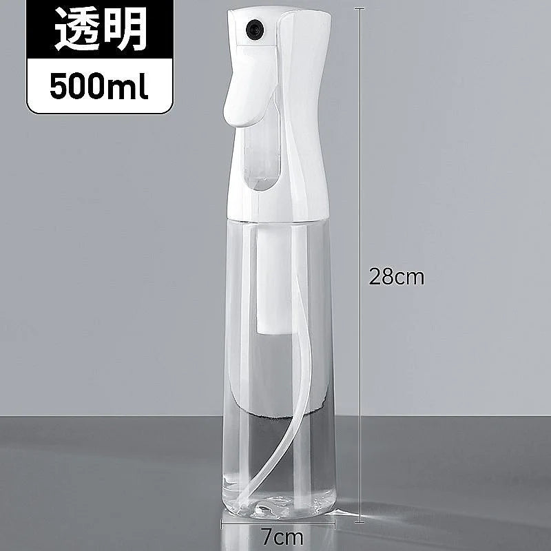 A clear, high-pressure mist spray bottle with a white nozzle and a 500ml capacity is shown standing vertically.