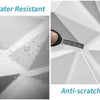 A set of white 3D diamond PVC wall panels showing water resistance and anti-scratch features.