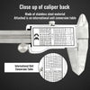 Close up of the back of a digital vernier caliper showing an international unit conversion table.