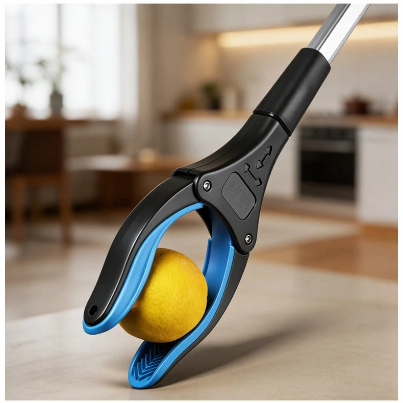 A close-up of a black and blue foldable magnetic reacher tool gripping a yellow ball.