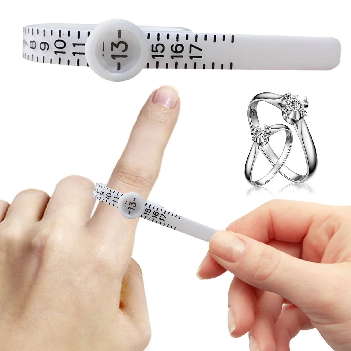 A hand holds a reusable ring sizer with a magnifier, showing the measurement scale and a ring.