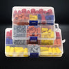 A clear plastic container holds various colored insulated wire connector nuts for electrical wiring.