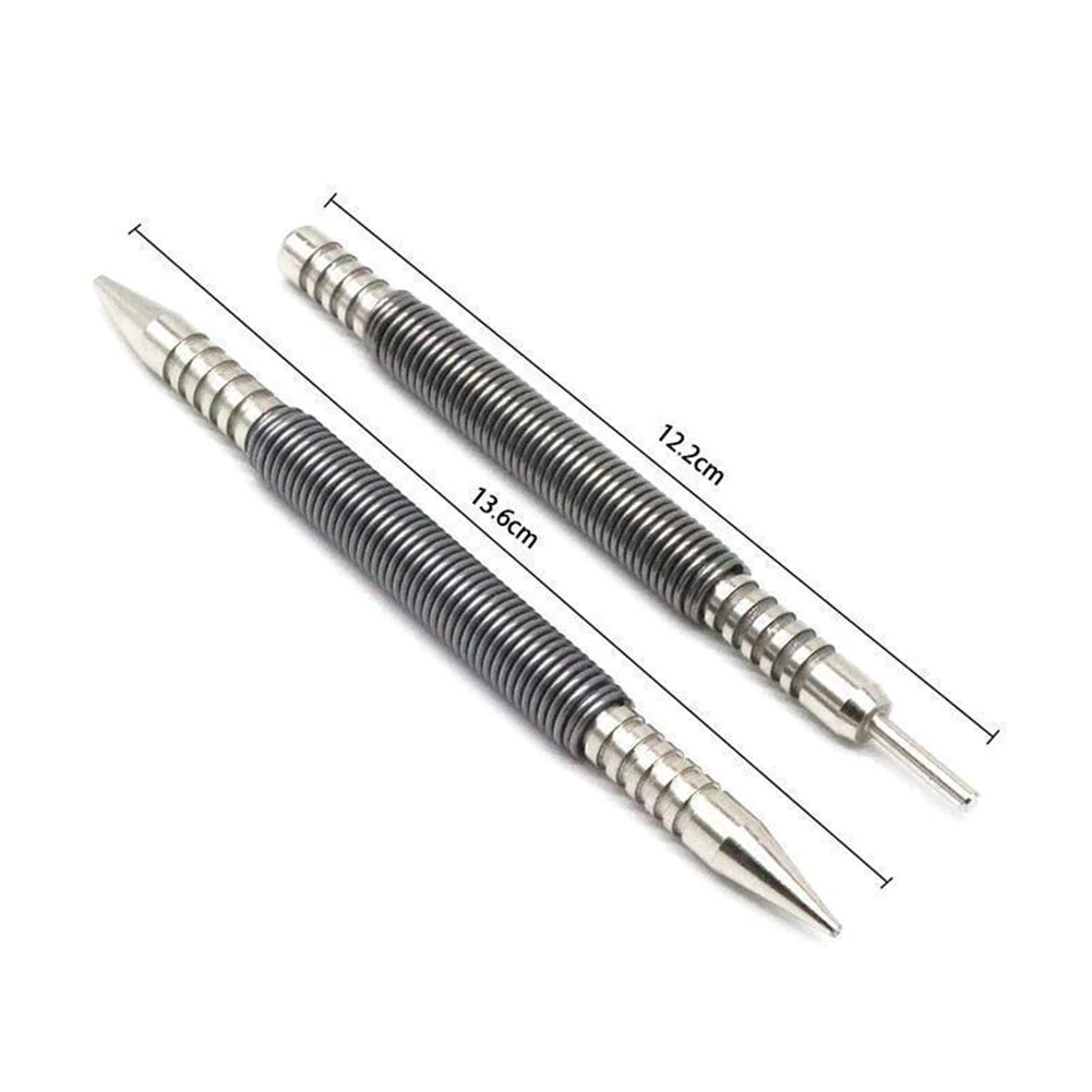 A close-up view of a dual-head spring nail set with marked dimensions showing the length of the nails.