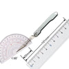A mini folding art knife with a metal blade and a scale showing measurements.