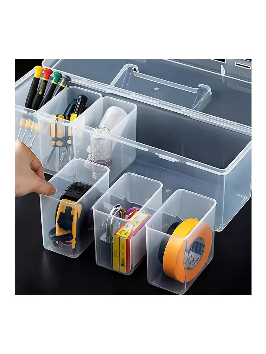 A transparent multi-compartment tool storage box with various tools and supplies organized inside.