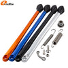 A set of black, blue, and orange motorcycle side stand kickstands with various mounting hardware.