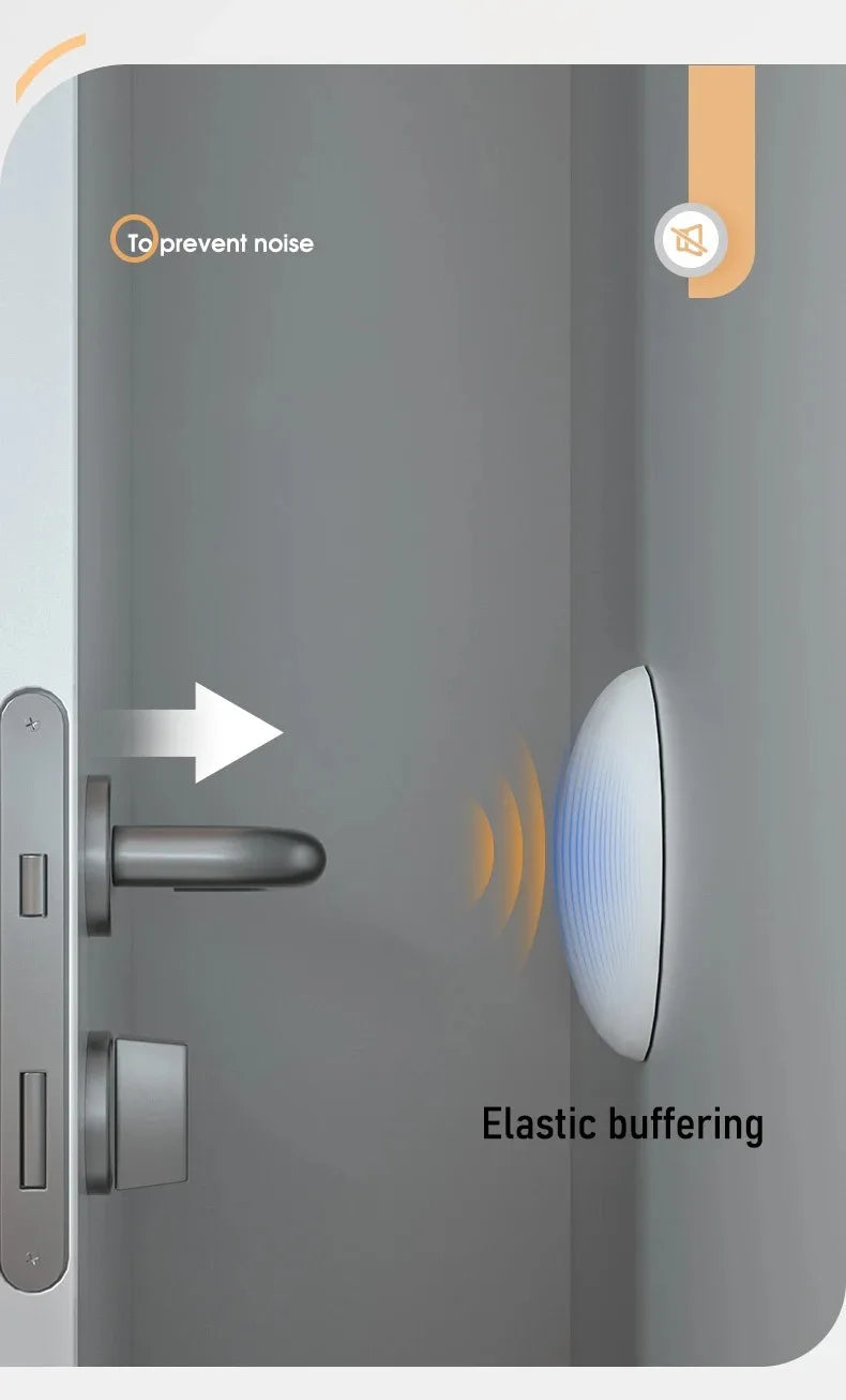 A close-up view of a door with silicone handle bumpers installed to prevent noise and protect the wall.