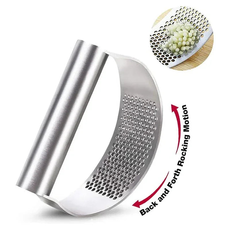 A manual stainless steel garlic and ginger press shown in a side view with a close-up of the textured pressing surface.