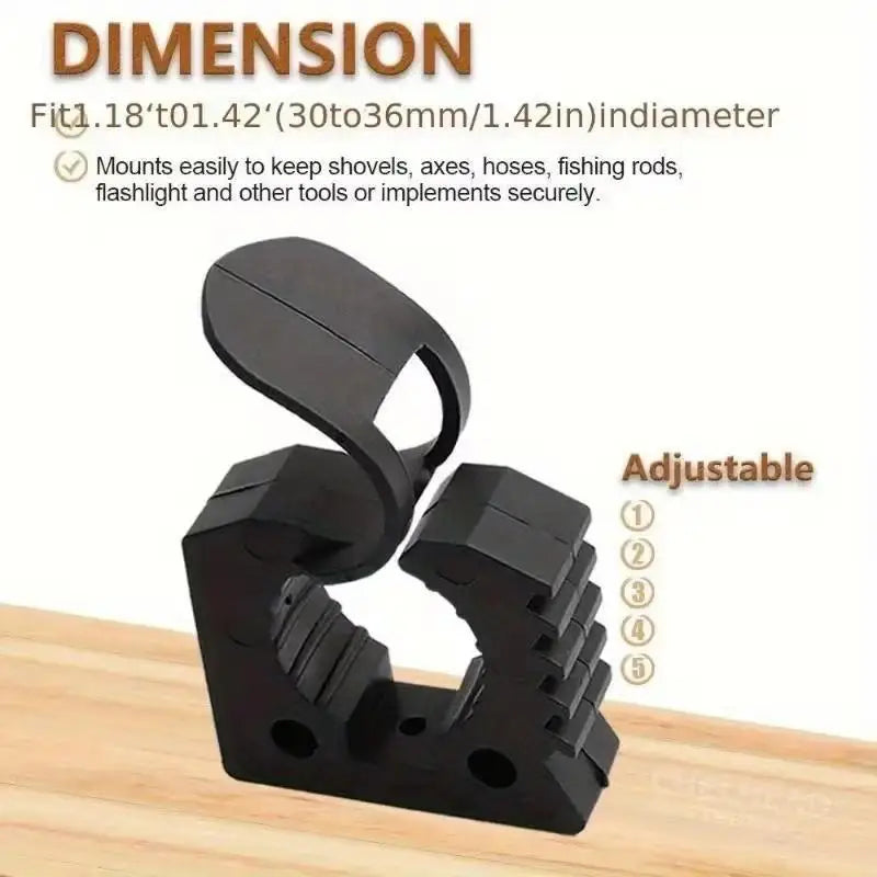 A black quick fist clamp tool is shown on a wooden surface, illustrating its adjustable design.